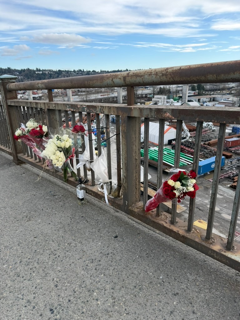 flowery memorial at the bridge