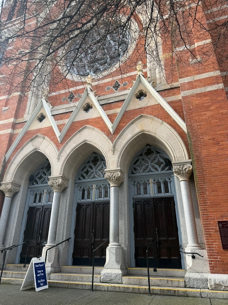 outside an old heritage building in downtown Victoria