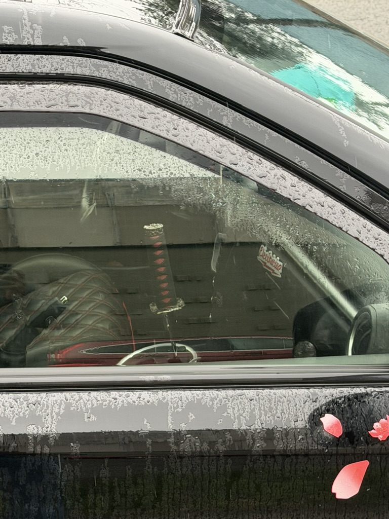 katana gear stick in a parked car