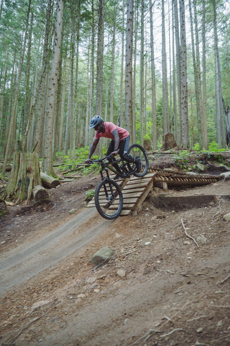 Day 1 of mountain biking: going down a roll on Bob Sled trail